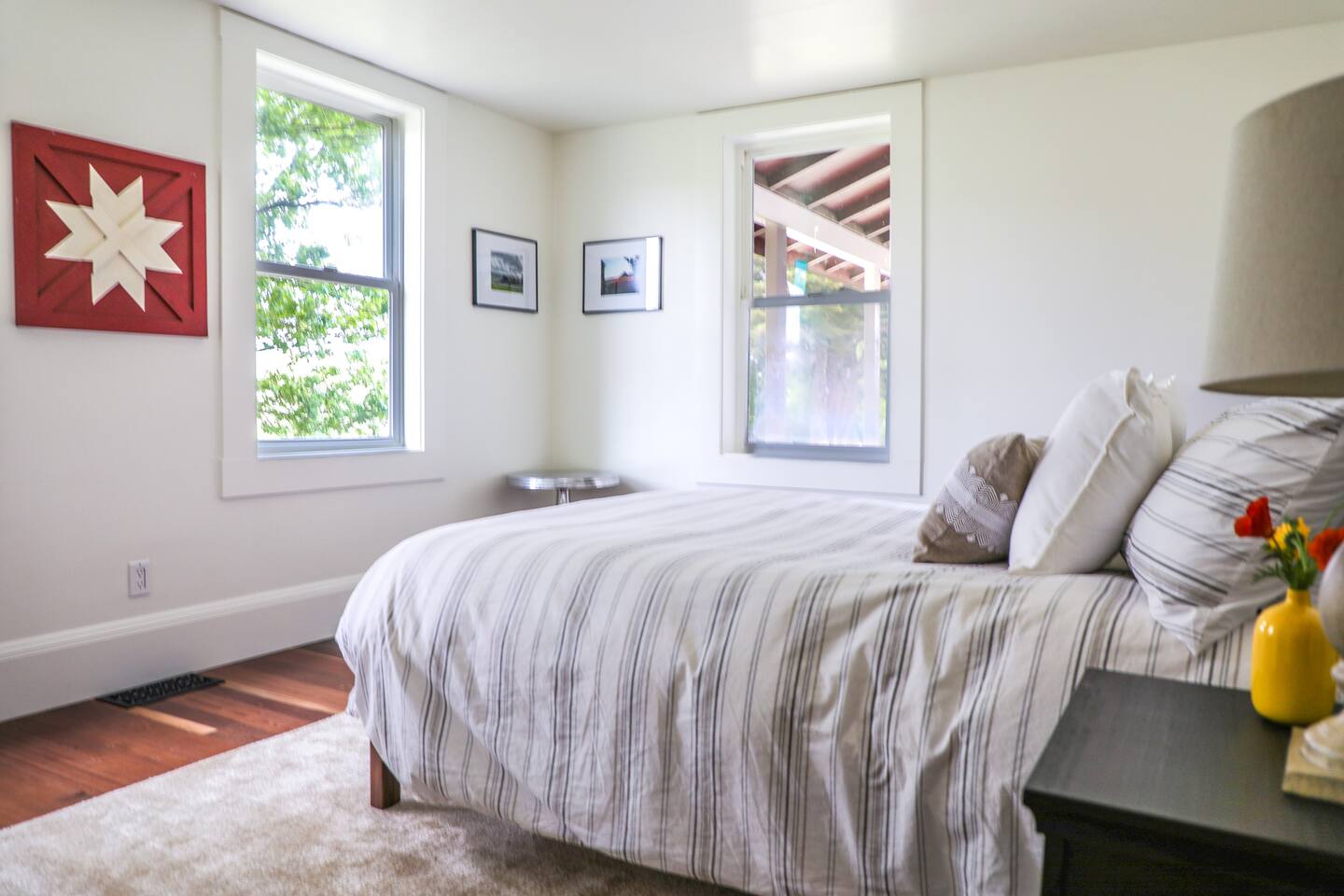 The first bedroom is downstairs and has a queen-sized bed.