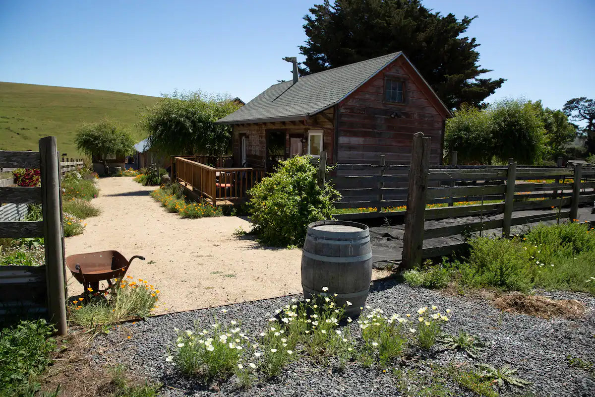 The Cabin at Stemple Creek Ranch. There is a private deck, outdoor seating, and views of the countryside.