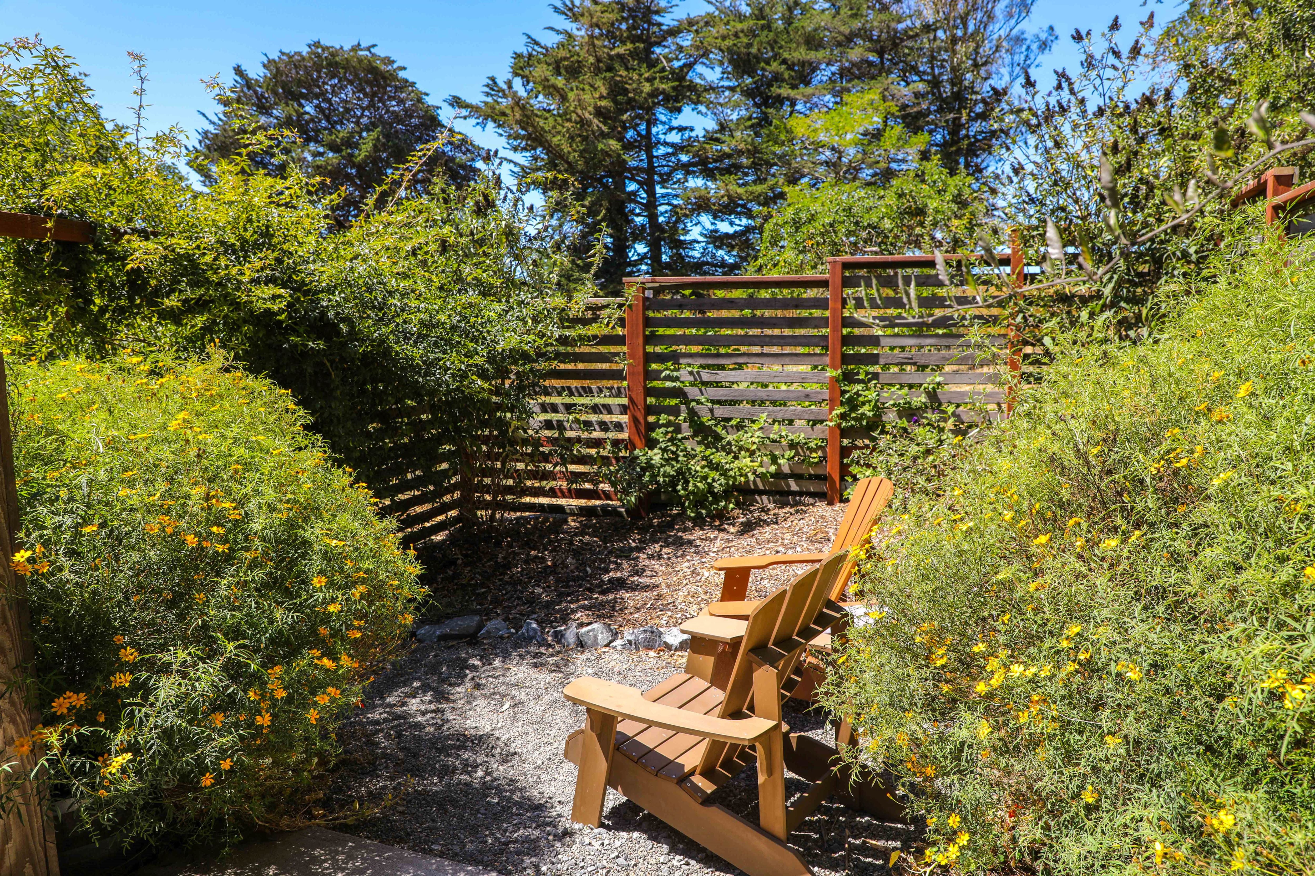 The privacy fence around the backyard of the Writer's Cottage. 