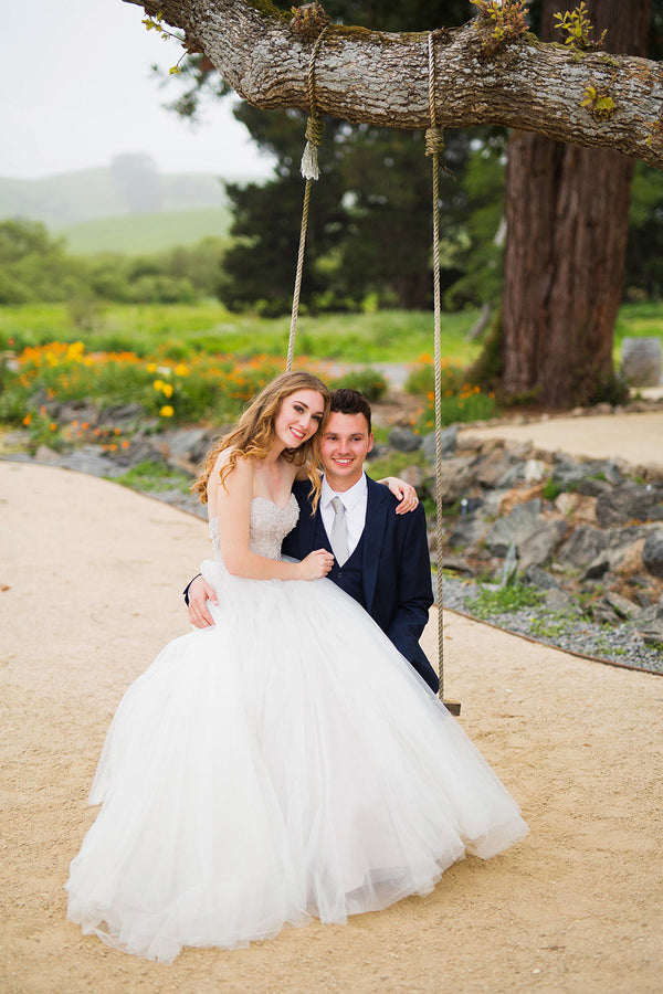 Couple enjoying romantic moments on the ranch swing